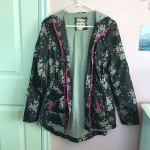 Grey rain jacket with floral design